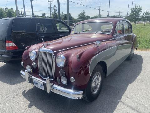 Burgundy 1961 Jaguar MK9